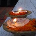 Lighting our prayers and letting them float on the great Ganje