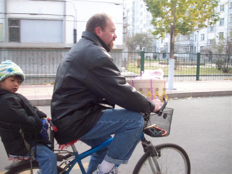 How you get the kid and cake to school at the same time