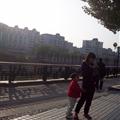 Woman knitted with kids climbing all over her